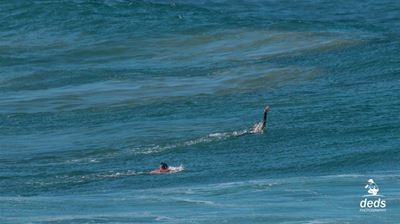 Waves at Vic Bay trap teen and dad