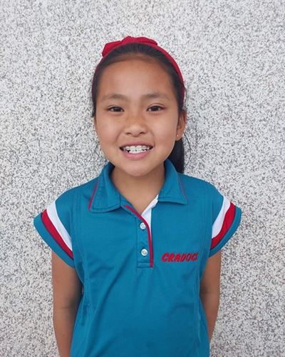 Tam excels in music exam