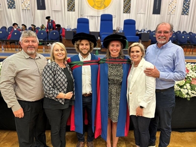 Two lovebirds graduate in formation