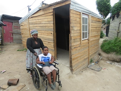 Wheelchair-bound in a shack