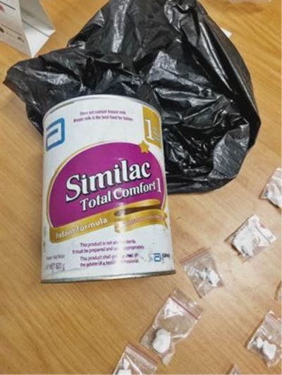Drugs found hidden in baby formula tins 