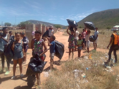 Children help clean environment during holidays