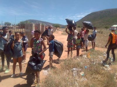 Children help clean environment during holidays