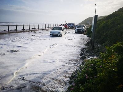 Waves sweep woman to her death
