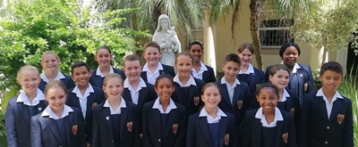 Holy Cross learners excel in music theory exams