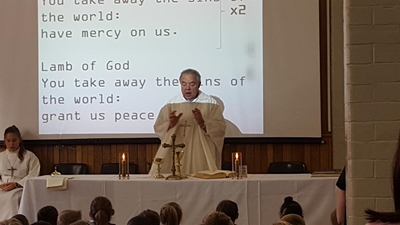 Holy Cross says goodbye to Father Johan