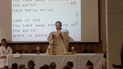 Holy Cross says goodbye to Father Johan