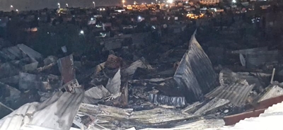 One dead, 50 families lose everything in Christmas Day fire