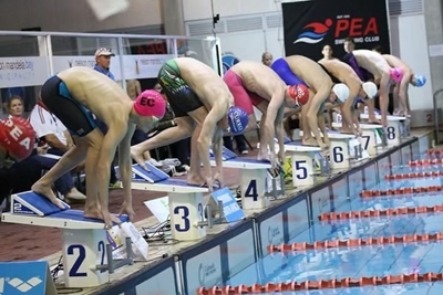 Local swimmers rake in medals and trophies
