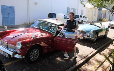 Classic car parade delights children from Lukhanyiso Safe House
