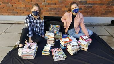 Learners donate to The Haven