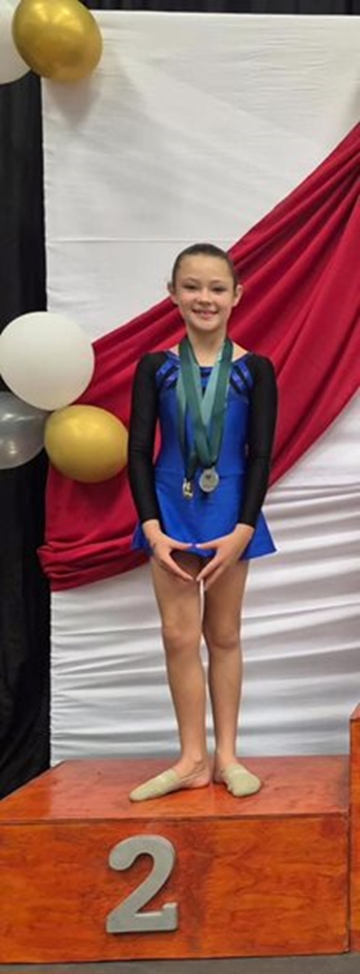Leerders presteer by ritmiese gimnastiek-uitdunne