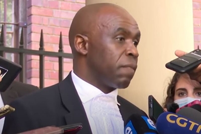 Parliament fire accused Zandile Mafe’s lawyer threatens NPA with court action