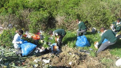 Learners help with clean-up operation