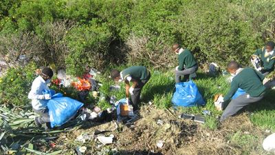 Learners help with clean-up operation