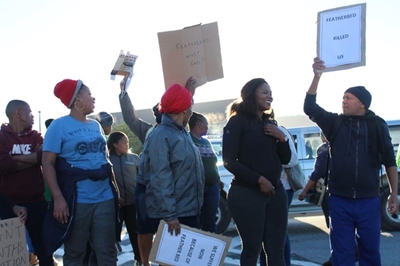 Aggrieved employees march against Featherbed Co