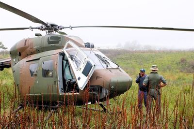 Army heli takes a breather in field at Delville Park