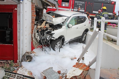 Man drives into barber shop