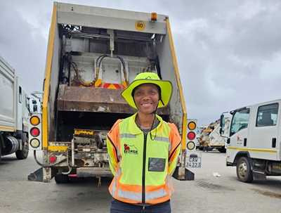 Refuse collector writes a book about her life from ruin to victory