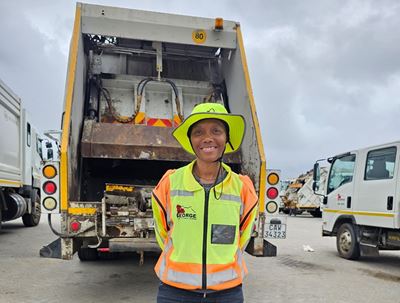 Refuse collector writes a book about her life from ruin to victory