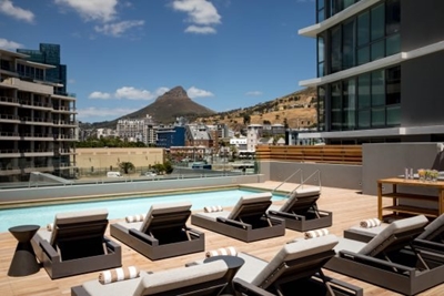 Weak economy stifles property industry while boosting tourism