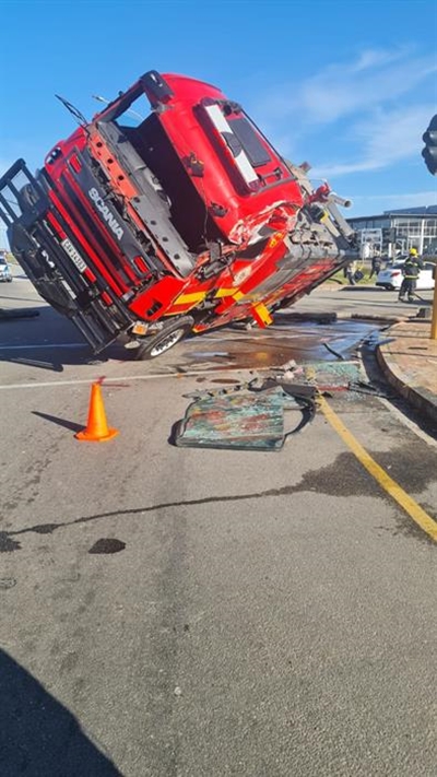 Fire engine overturns en route to fire