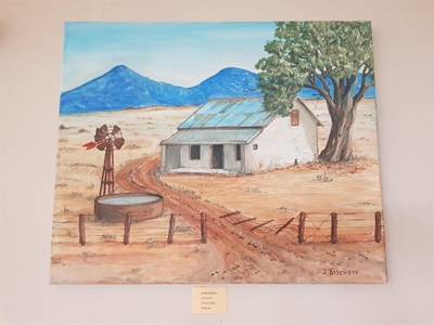 Artist paints miniatures and murals