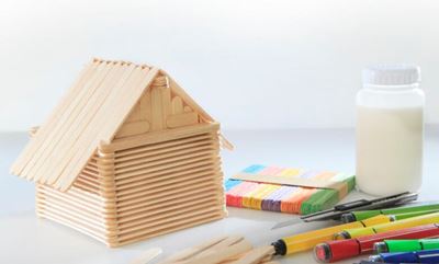 Help your child build a house out of popsicle sticks