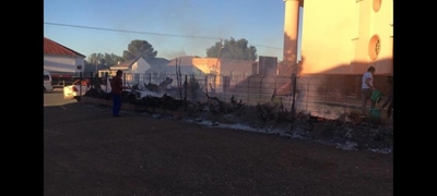 Geskiedkundige sipresheining brand af