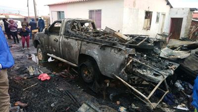 Brand verwoes sewe opslaanhutte
