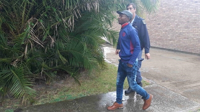 Double murder accused back in court