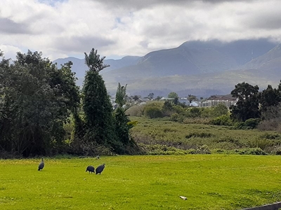 Cloudy to partly cloudy with the possibility of rain on Tuesday