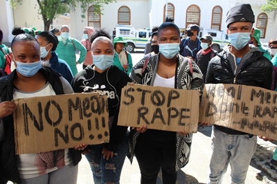 Protesters gather outside court