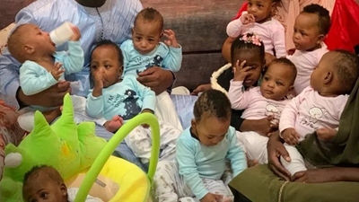 Family sets world record after returning home to Mali with nine healthy nonuplet babies