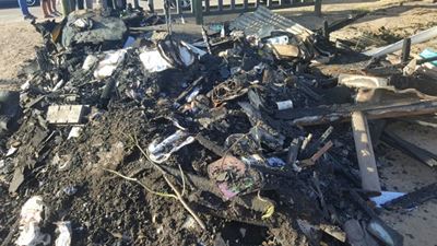 Wooden house gutted in fire