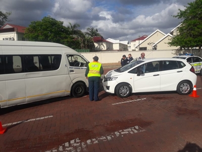 Taxi and car in head-on collision
