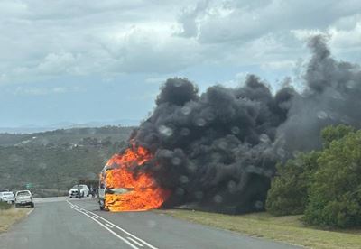 Tour bus burns out