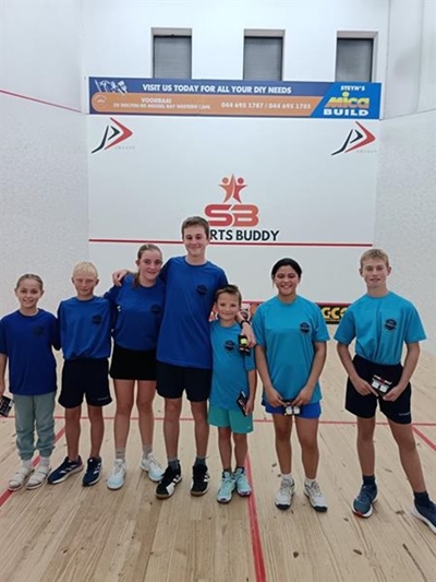 Young talent compete on squash courts