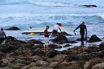 Boat capsizes at the Point