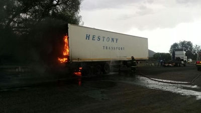 Truck engulfed by flames