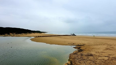River mouth opened as high water threatens houses, properties