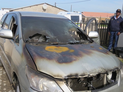 Vehicles torched and taxis remain suspended