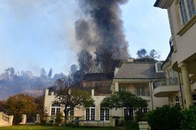 Wildfires scorch homes of the rich and famous in Los Angeles