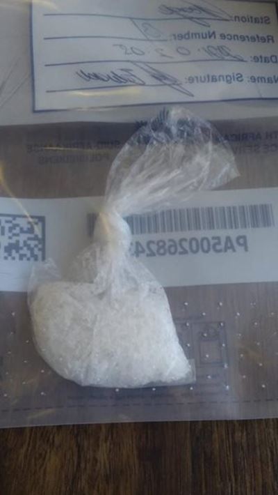 Drugs, drink and ammo land 2 in jail