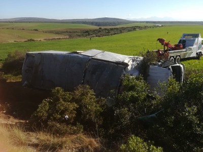 Truck overturns 