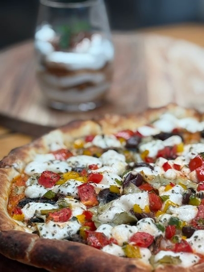 Vegan pizzas supreme for International Pizza Day