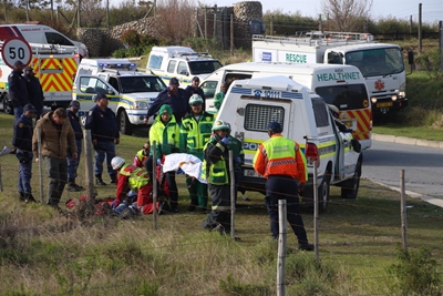 Police van overturns, 11 injured
