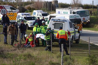 Police van overturns, 11 injured