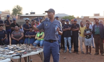 Residents hand over illegal weapons, collected over months, to Potchefstroom police