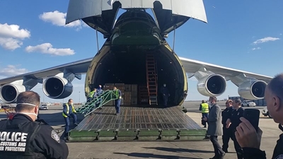 Russian plane with supplies for virus fight lands in US